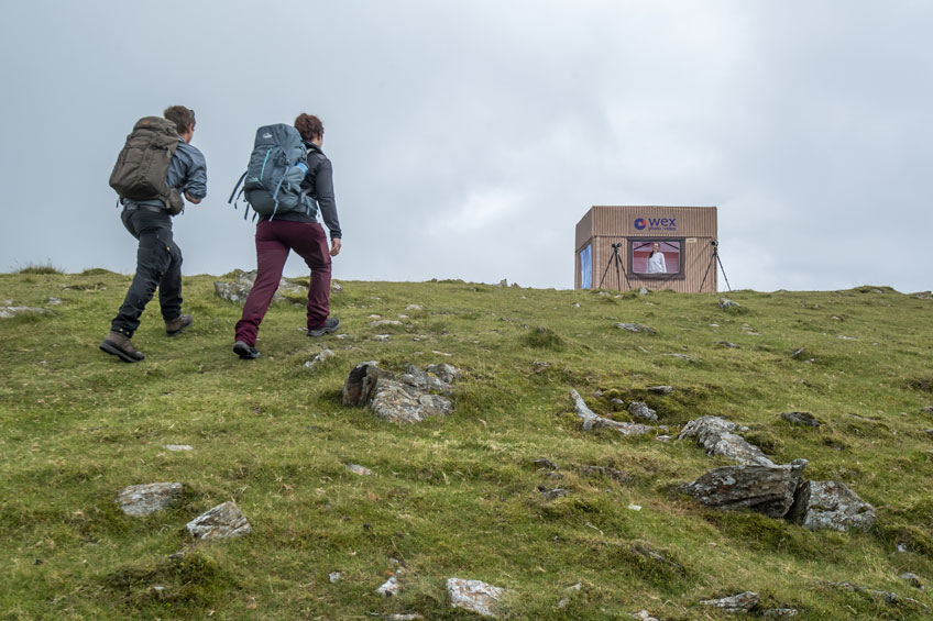 Hikers make their way up to the UK's most remote camera store, opened by Wex Photo Video in Snowdonia, Wales