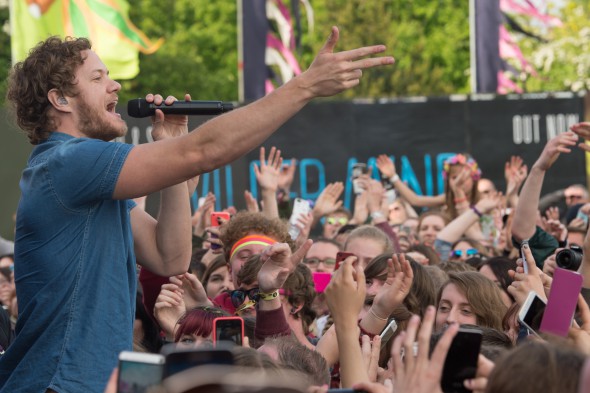 Dan Reynolds of Imagine Dragons amidst a festival crowd