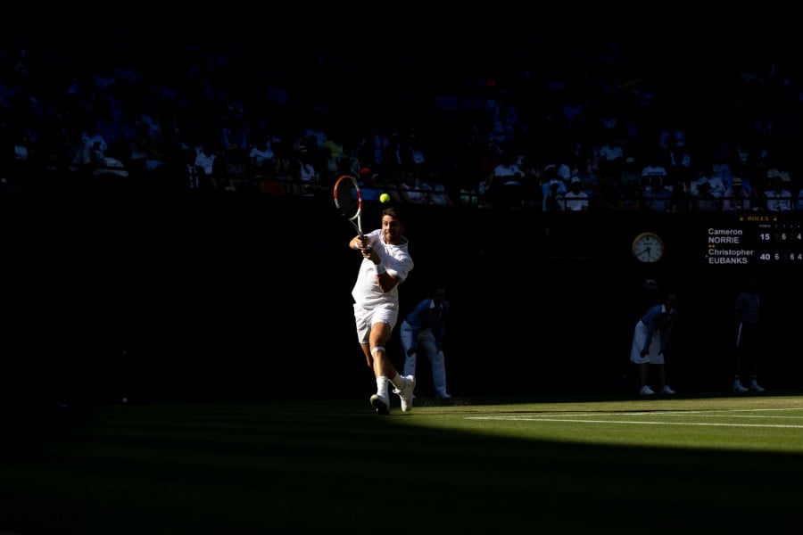 A photo of tennis players at Wimbledon by Eddie Keough