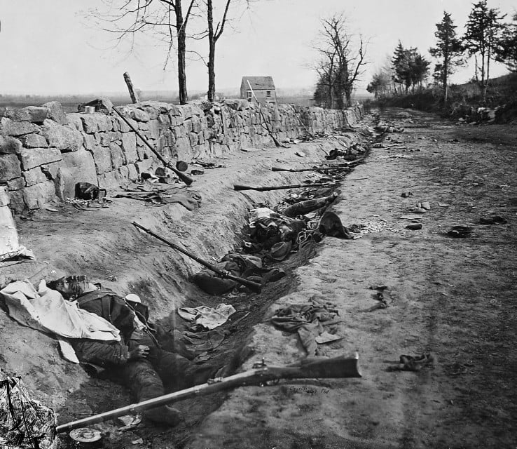 Fallen Confederate soldiers behind the stone wall at the foot of Marye&rsquo;s Heights in Fredericksburg, Virginia, photographed on May 3, 1863.