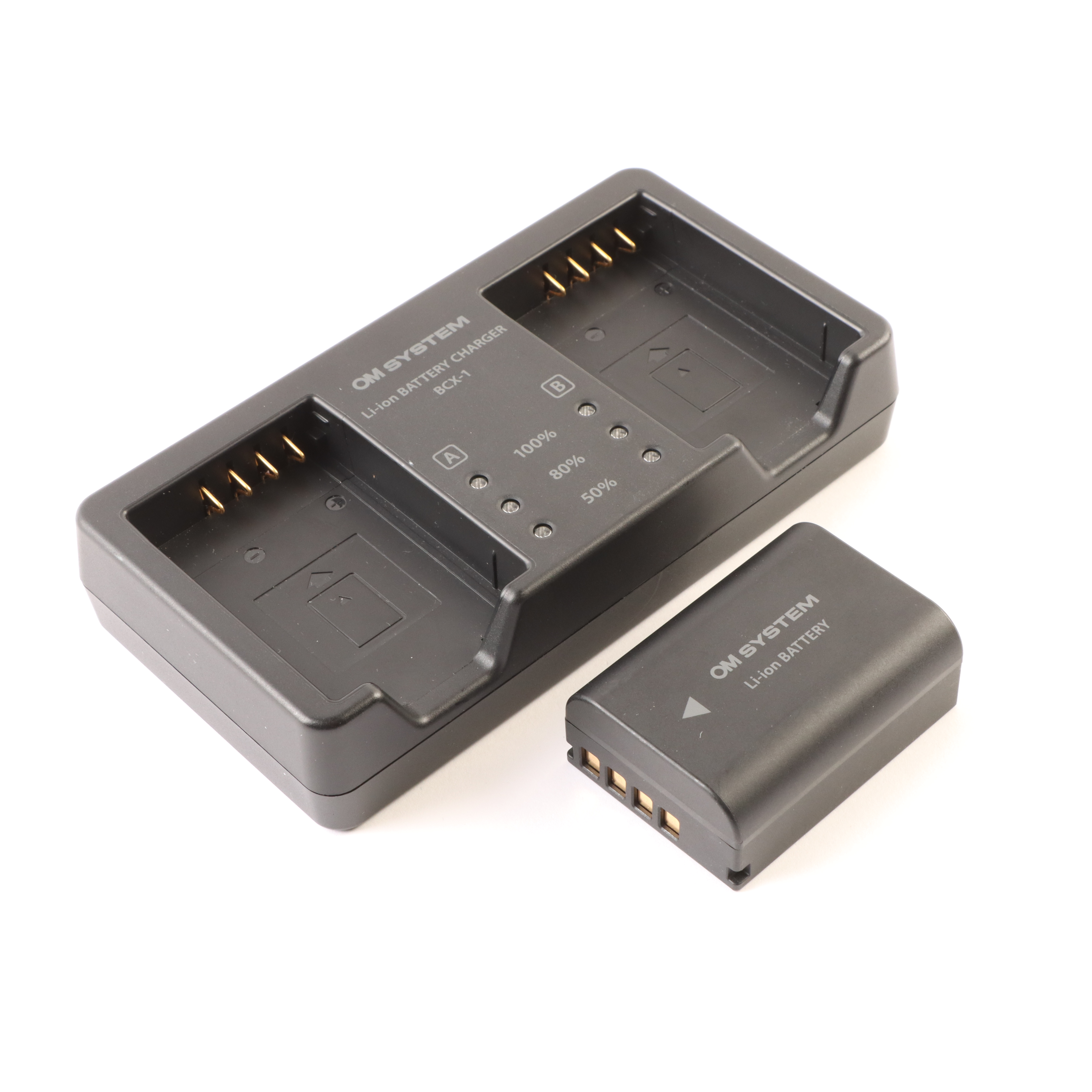 USED OM SYSTEM SBCX-1 Battery and Charger Kit