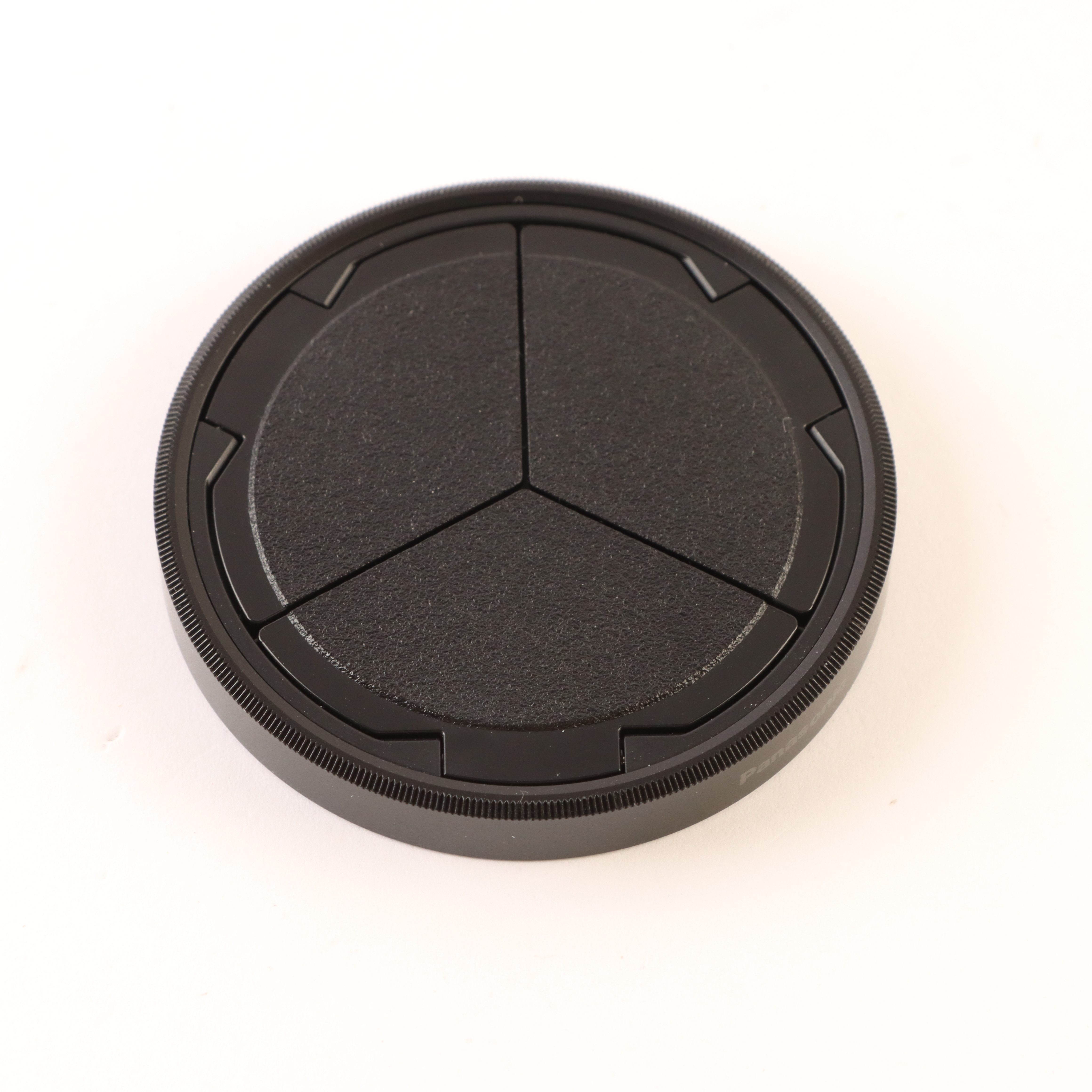 USED Panasonic DMW-LFAC1 Auto Lens Cap - Black